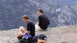 Another visitor to Pulpit Rock is actually sitting with his legs dangling over the edge!  Not even Tao would do that!
